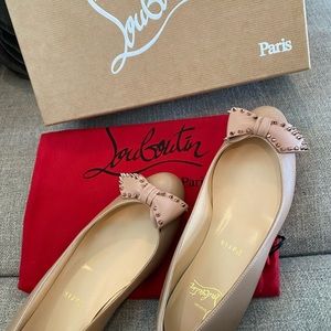 New never worn Christian Louboutin flats